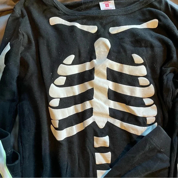 2 pairs used skeleton pj size 12 kids. Halloween costume? - Picture 2 of 8